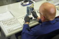 a man working with a medical device or implant