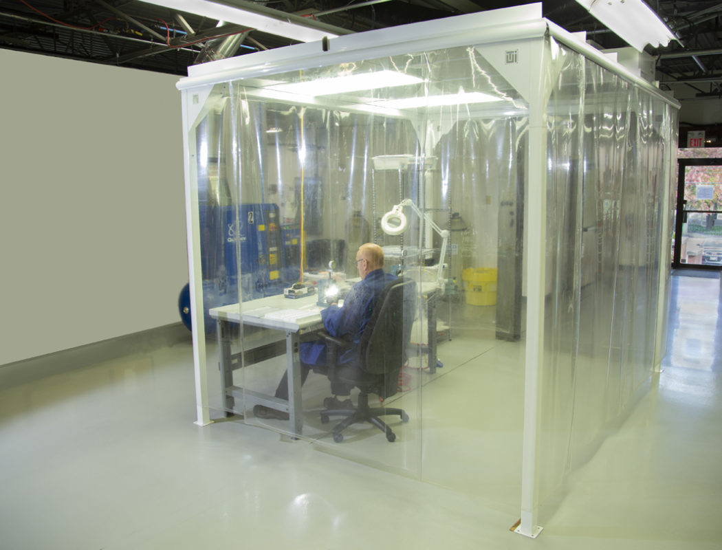 man working in a clean room